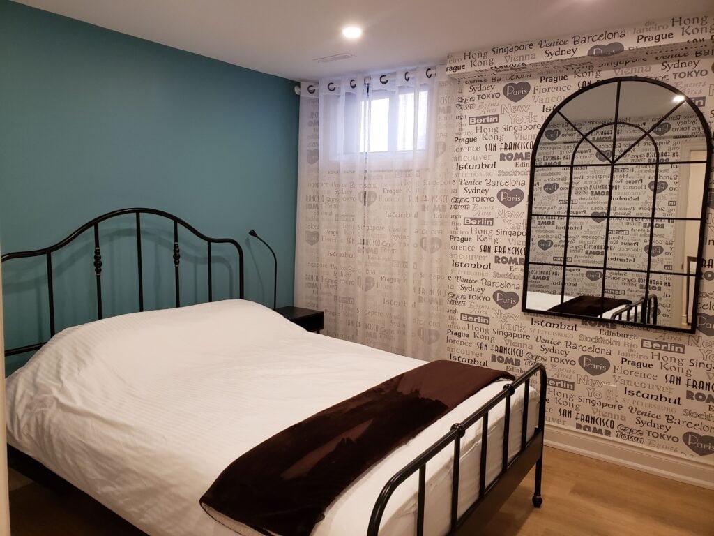 Furnished 2-bdrm, 1-bath walk-out basement unit with parking