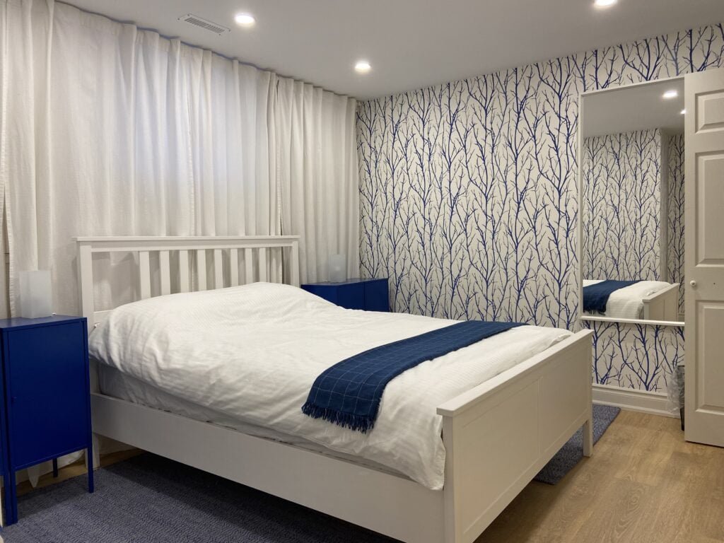 Furnished 2-bdrm, 1-bath walk-out basement unit with parking