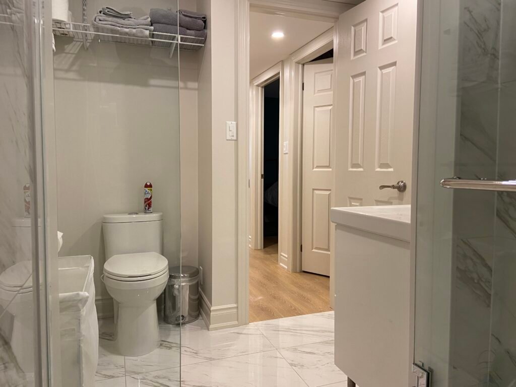 Furnished 2-bdrm, 1-bath walk-out basement unit with parking